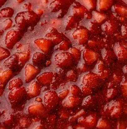 100 % Căpșuni fără zahăr adăugat, cu bucăți extra de fructe