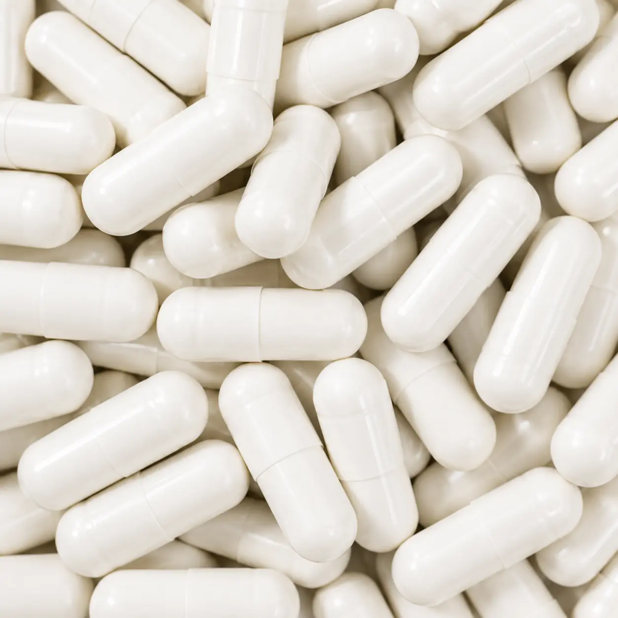 Detaliu capsule probiotice albe